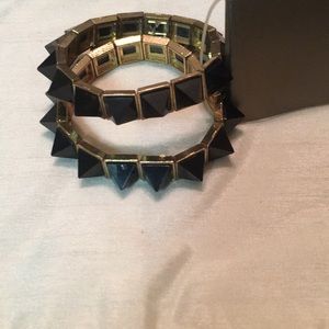 Black  stretchy spiked bracelets gold toned